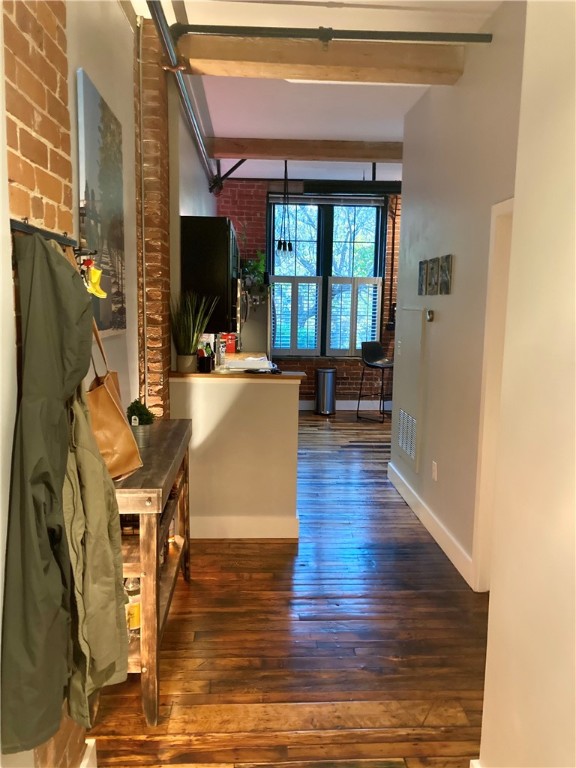 99 Allen Street, Unit 117 Woonsocket, RI 02895 - Photo 7 of 25 Looking into the unit and towards the river from the entry to the unit.