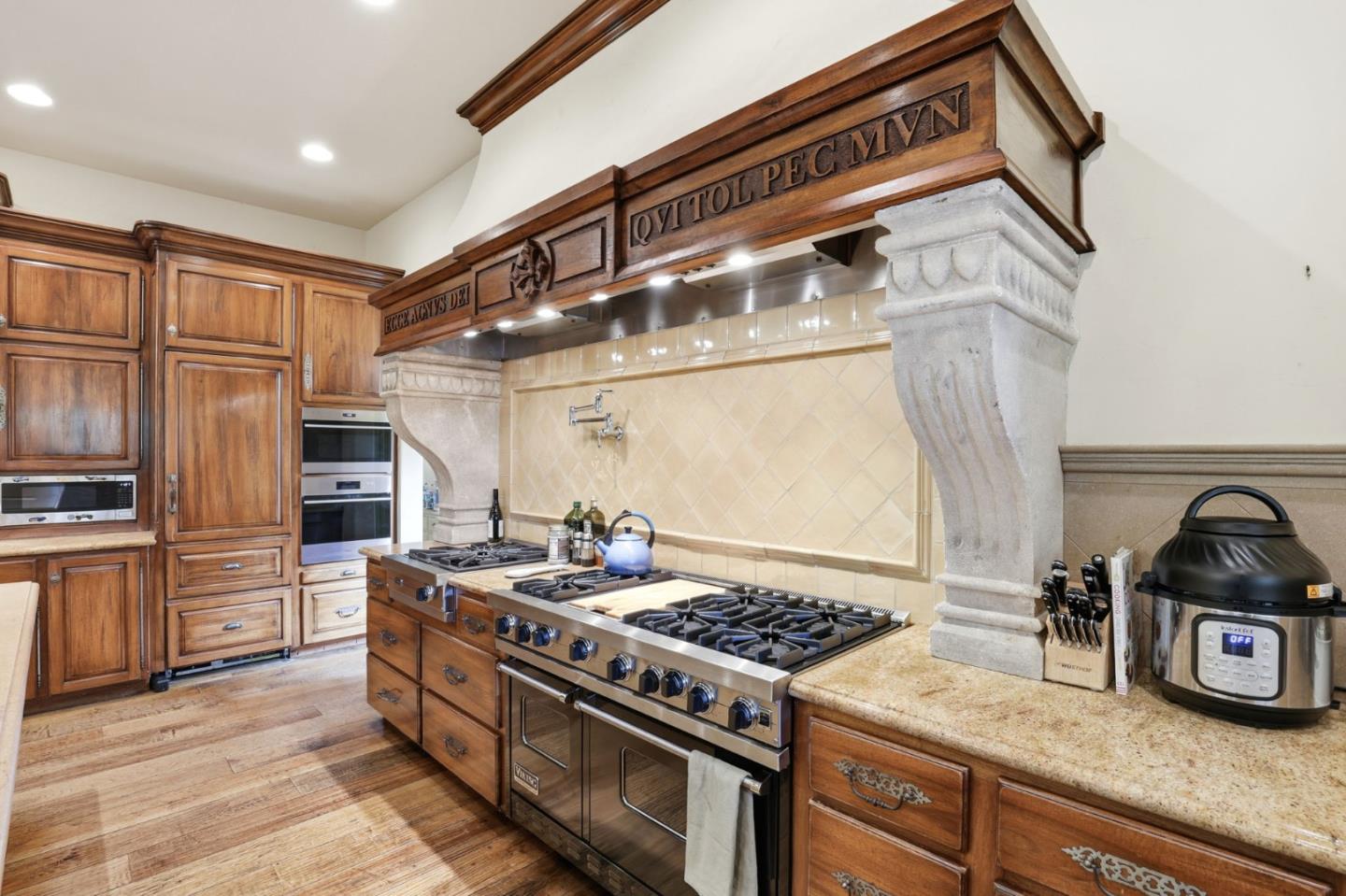 505 Gordon Avenue San Jose, CA 95127 - Photo 21 of 62 a kitchen with granite countertop stainless steel appliances and wooden cabinets