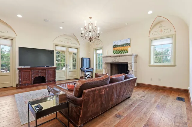 a bathroom with a double vanity sink and a toilet