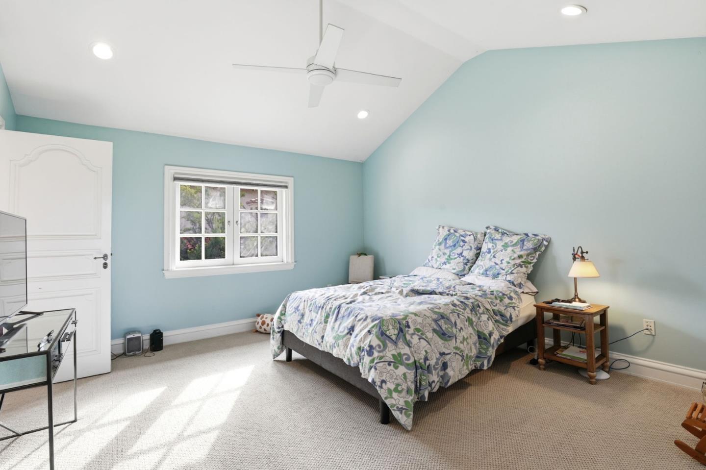 505 Gordon Avenue San Jose, CA 95127 - Photo 24 of 62 a bedroom with a bed and a table in it