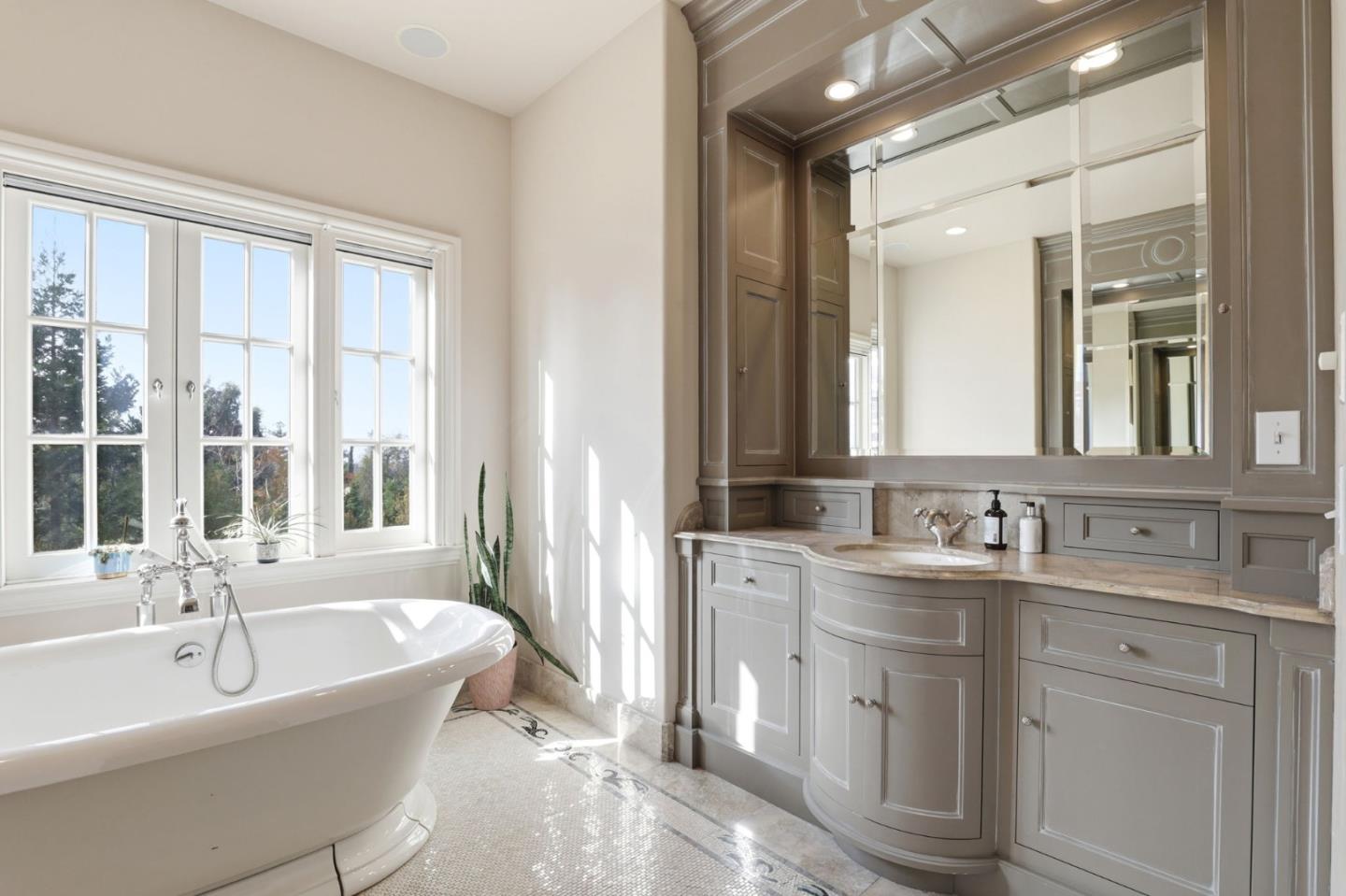 505 Gordon Avenue San Jose, CA 95127 - Photo 29 of 62 a bathroom with a tub sink and mirror