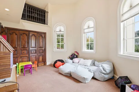 a kitchen with a stove and a refrigerator