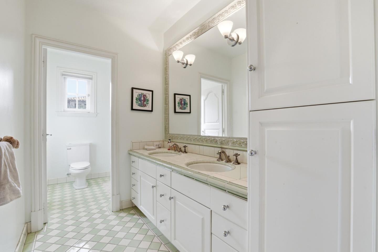 505 Gordon Avenue San Jose, CA 95127 - Photo 37 of 62 a spacious bathroom with a granite countertop sink and a mirror