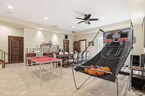 a backyard of a house with yard and outdoor seating