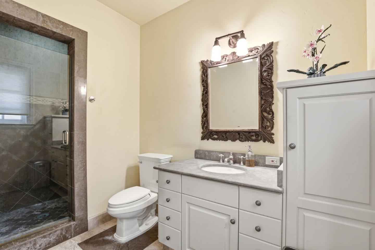 505 Gordon Avenue San Jose, CA 95127 - Photo 45 of 62 a bathroom with a toilet sink and shower