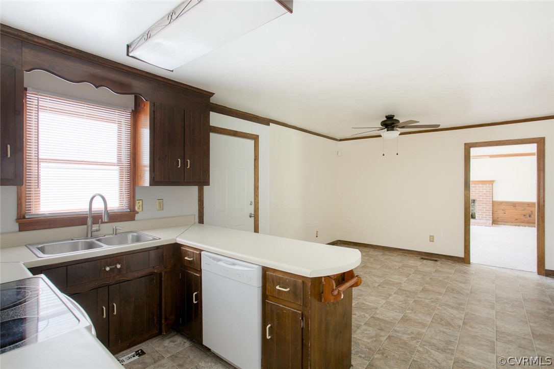 2001 Mt Blanco Road Chester, VA 23836 - Photo 9 of 28 a kitchen with a sink a stove and cabinets