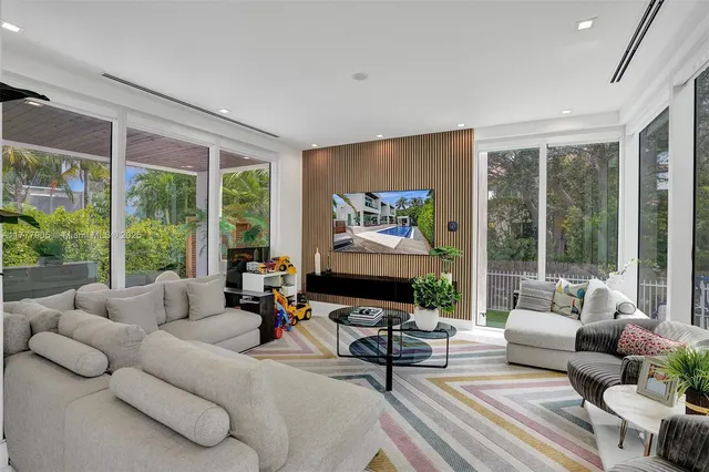 a outdoor space with a couch and a potted plant