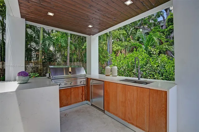 a bedroom with a bed and a night stand