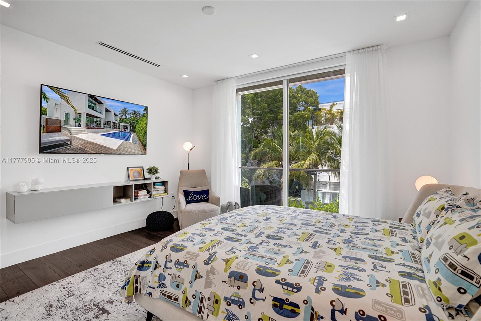 201 Buttonwood Drive Key Biscayne, FL 33149 - Photo 60 of 80 a bed sitting in a bedroom next to a window