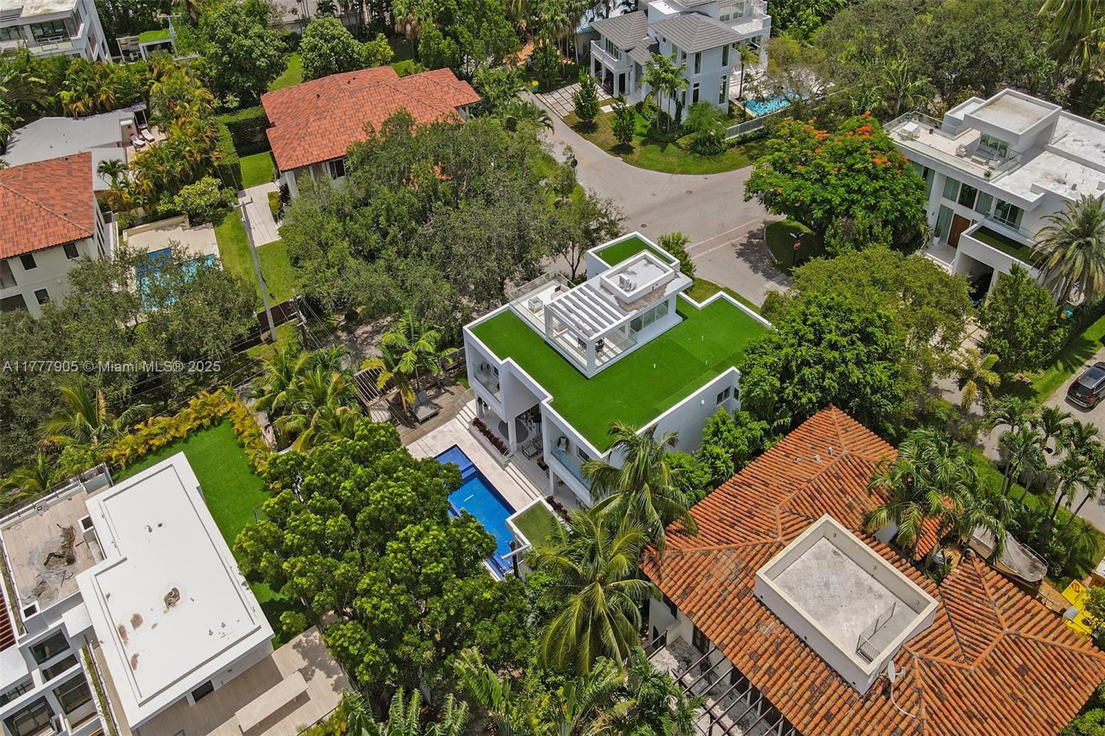 201 Buttonwood Drive Key Biscayne, FL 33149 - Photo 78 of 80 an aerial view of a house with a yard