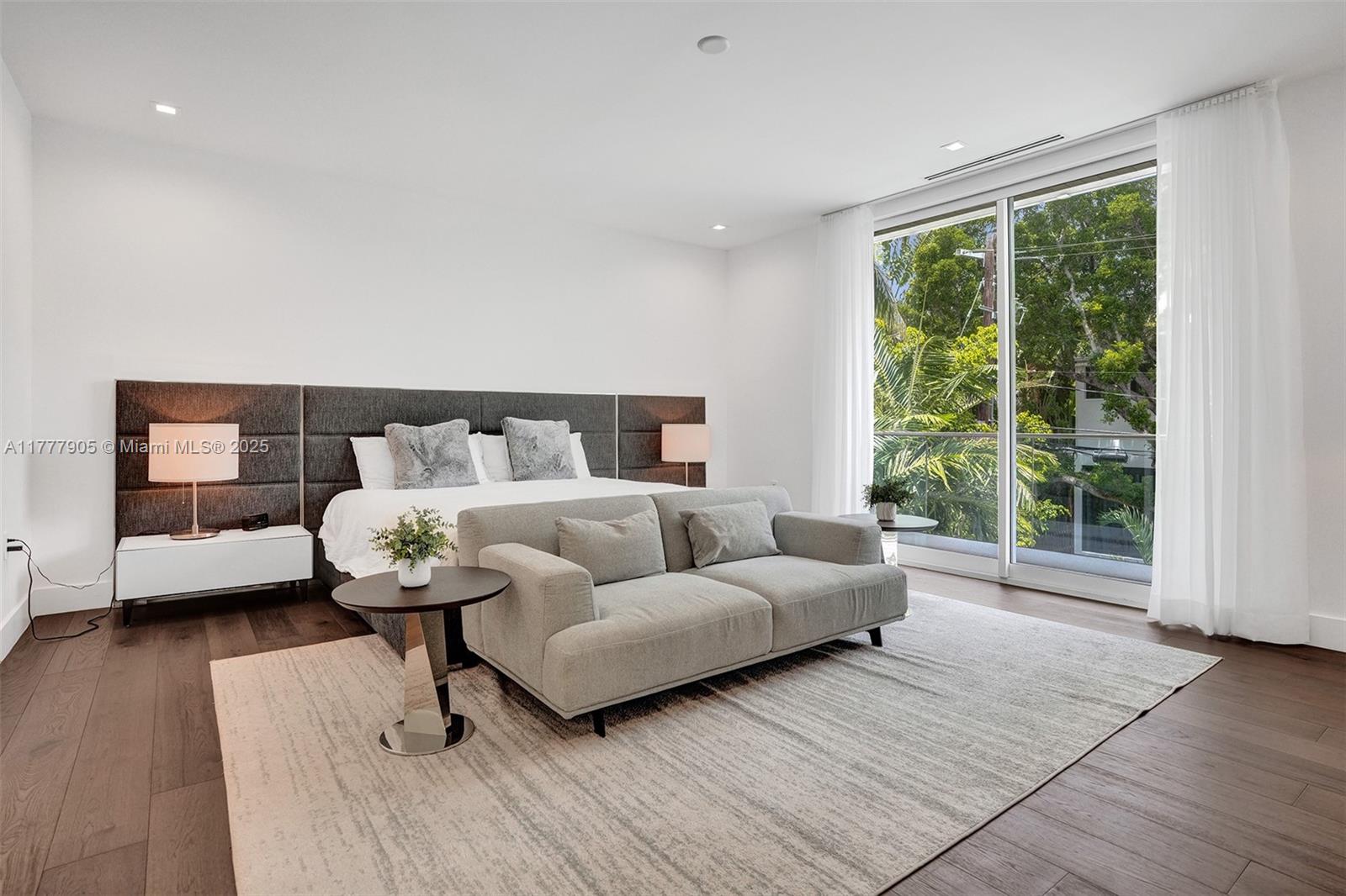 201 Buttonwood Drive Key Biscayne, FL 33149 - Photo 9 of 80 a living room with furniture and a large window
