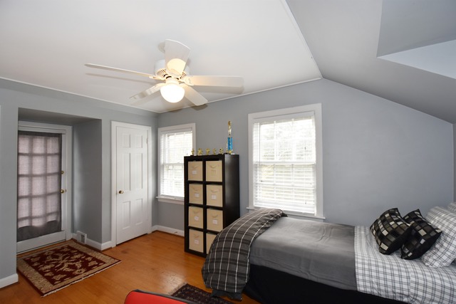 1130 Raleigh Road Glenview, IL 60025 - Photo 20 of 25 a bedroom with a bed and a window