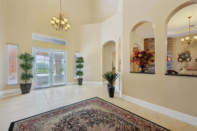 a bathroom with a bathtub and a shelf