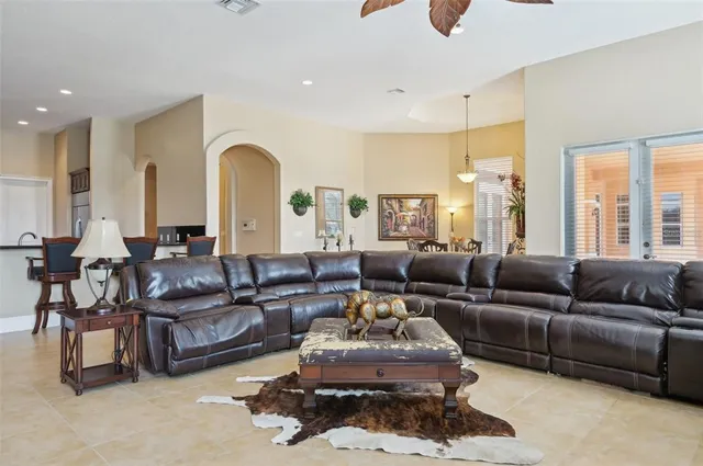 a bedroom with bed and a window