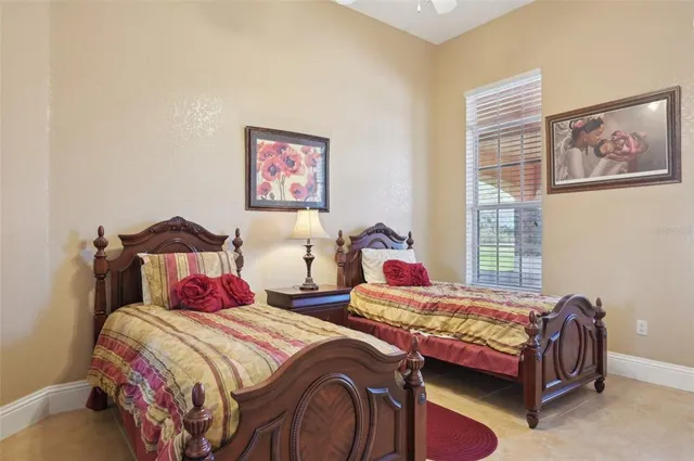 a view of a swimming pool with a backyard