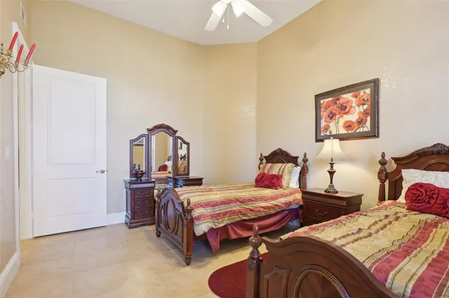 a view of a backyard with a swimming pool