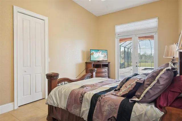 an aerial view of houses with a swimming pool
