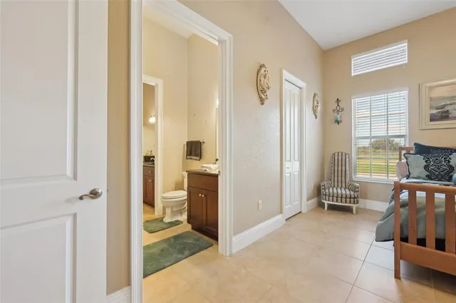 an aerial view of a house with a ocean view