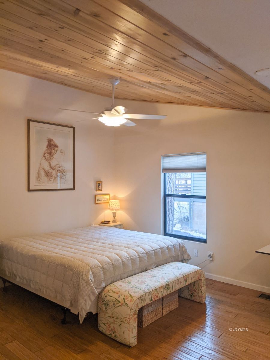 52790 Idyllmont Road Idyllwild, CA 92549 - Photo 34 of 65 a bedroom with a bed and a window