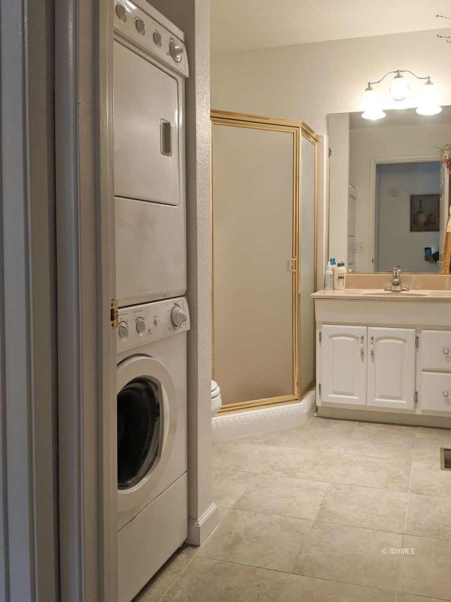 52790 Idyllmont Road Idyllwild, CA 92549 - Photo 45 of 65 a view of a hallway with washer and dryer
