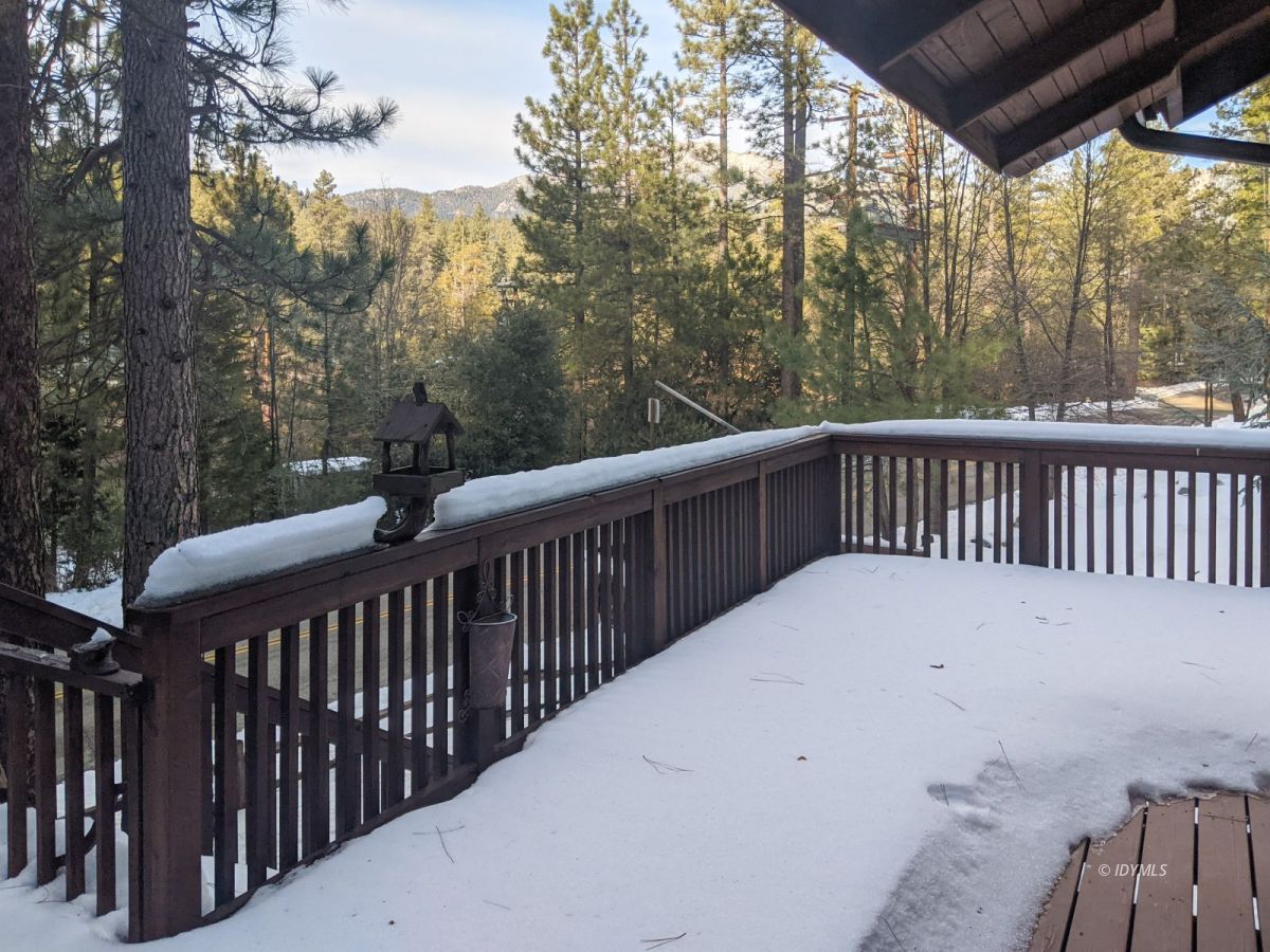 52790 Idyllmont Road Idyllwild, CA 92549 - Photo 54 of 65 a balcony of view with wooden floor and fence