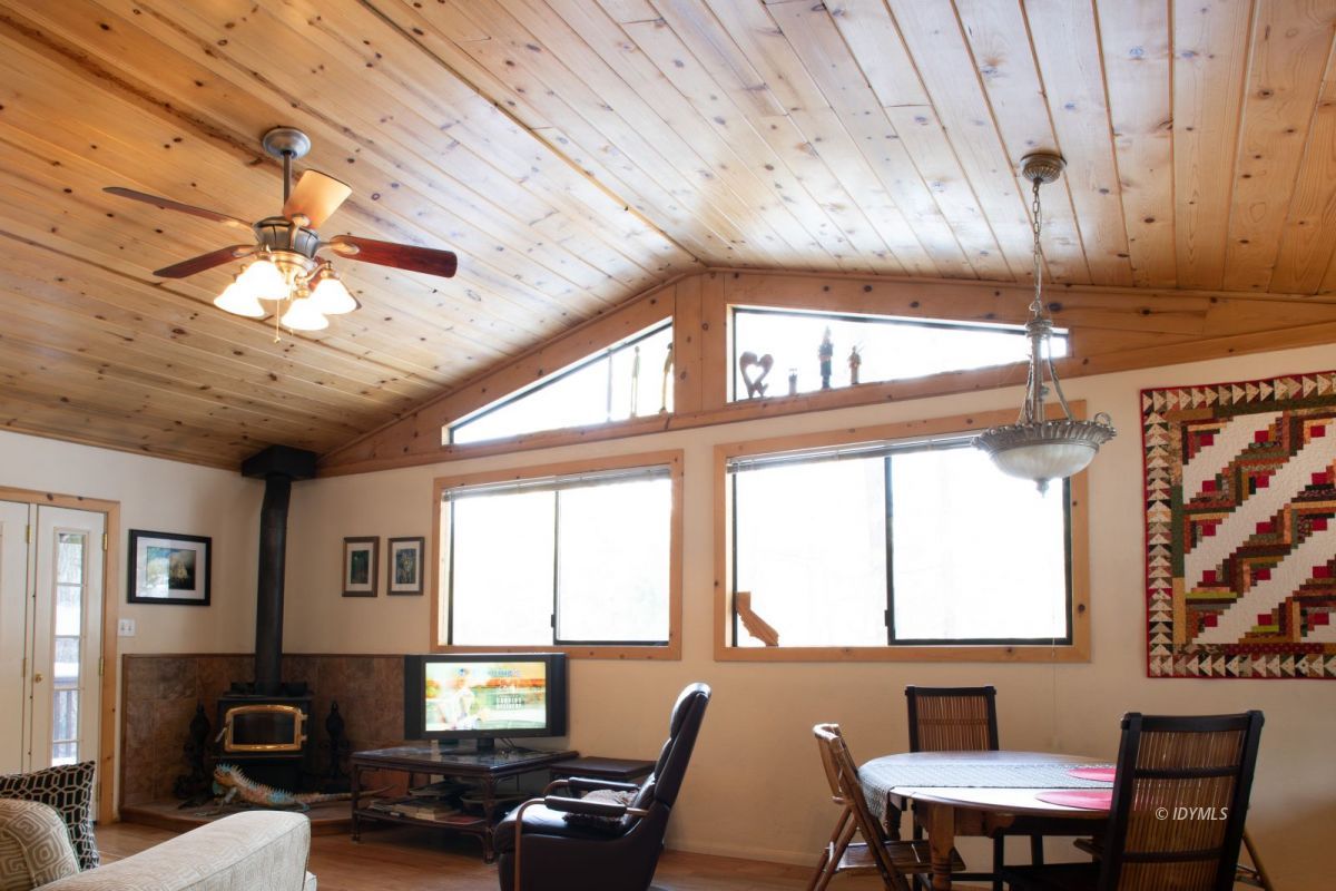 52790 Idyllmont Road Idyllwild, CA 92549 - Photo 65 of 65 a view of a livingroom with furniture window and wooden floor