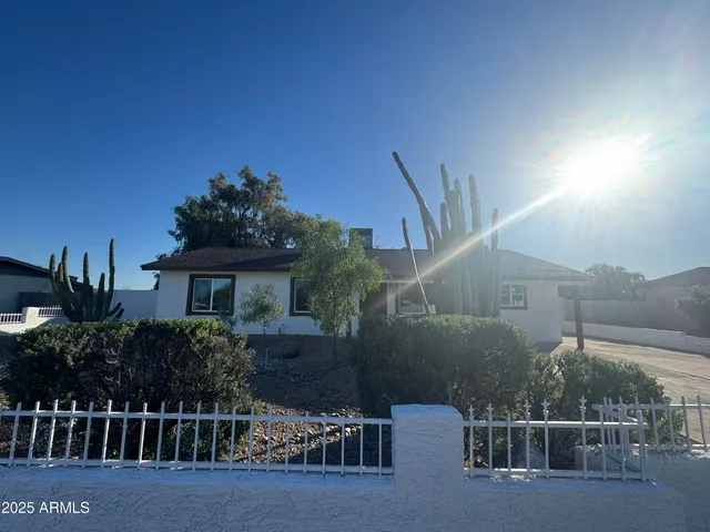 a house view with a garden space