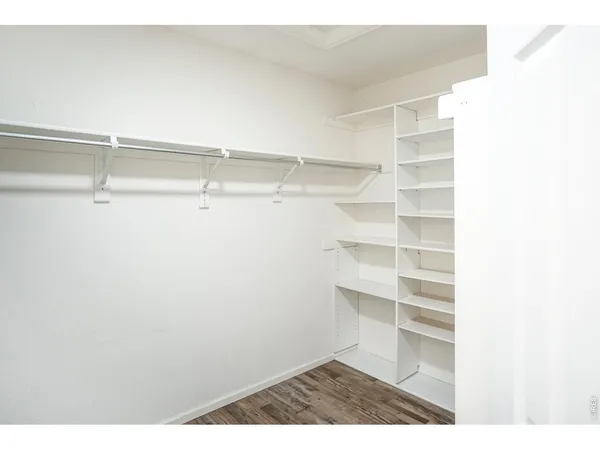 a view of a room with racks on the wall