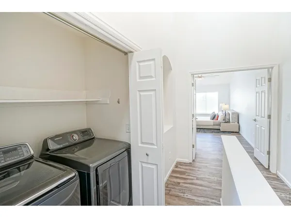 a view of a kitchen from the hallway