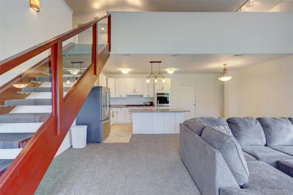 a large living room with a large window