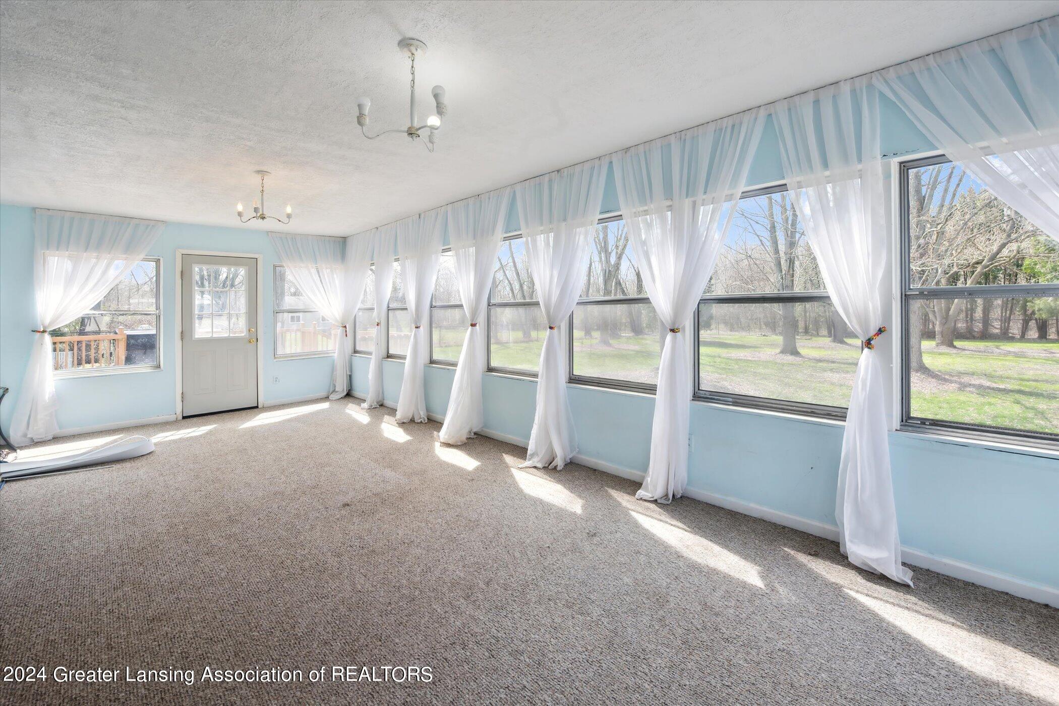 2385 Pine Tree Road Holt, MI 48842 - Photo 28 of 55 Three Seasons Room