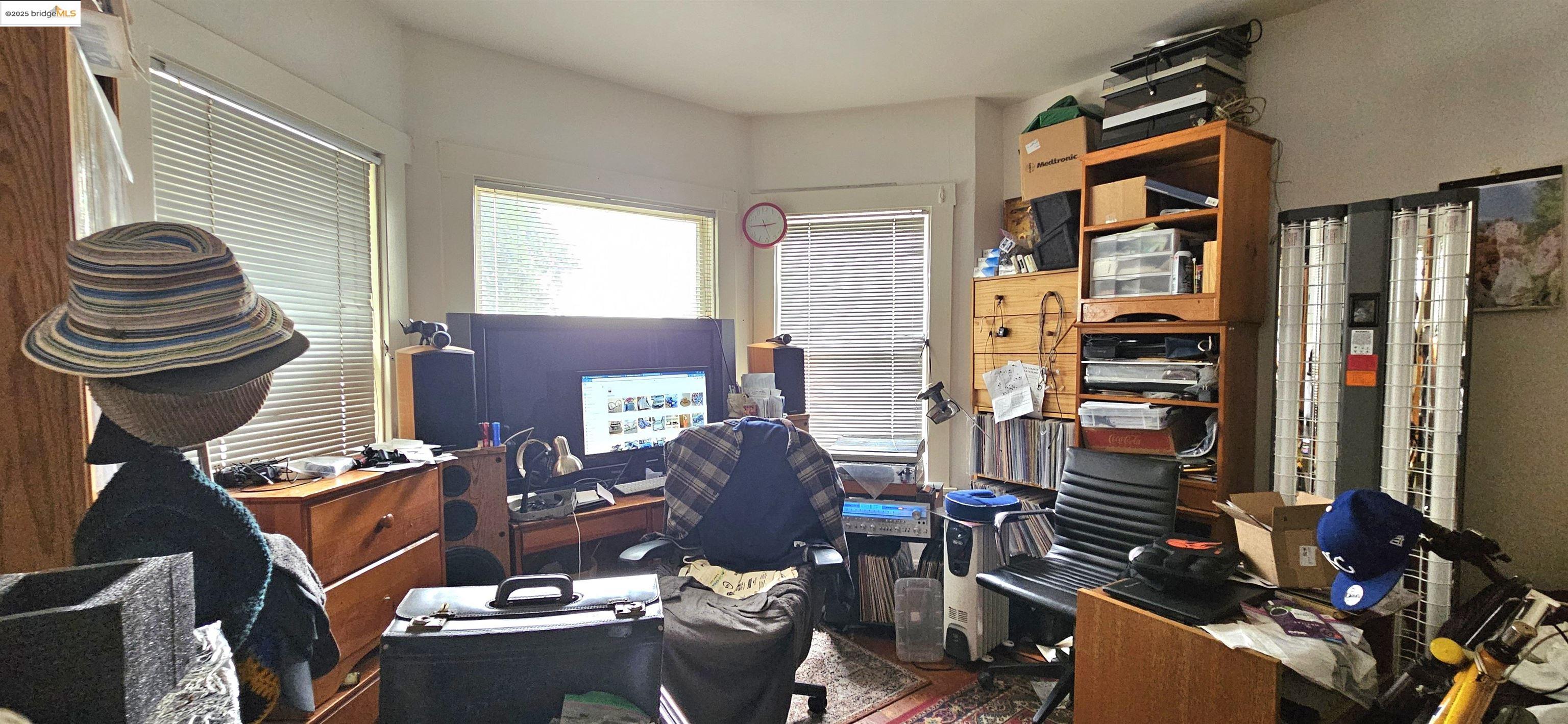 2308 Parker Street Berkeley, CA 94704 - Photo 10 of 17 a room with furniture and a window