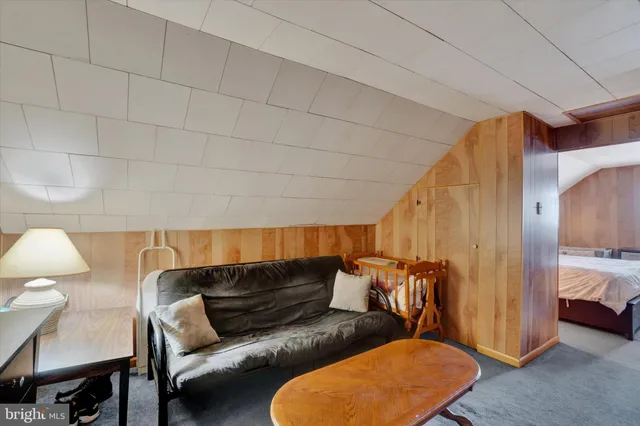 a bedroom with furniture and a couch