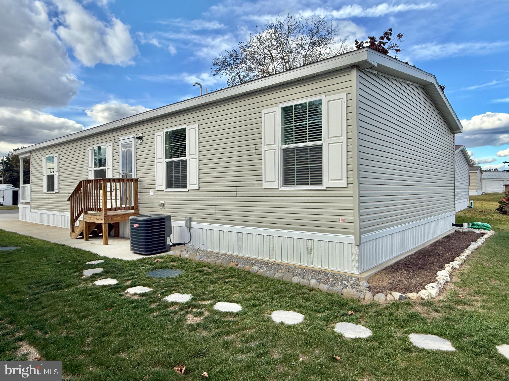 768 East Garden Road, Unit 7 Vineland, NJ 08360 - Photo 11 of 37 a view of a house with a yard