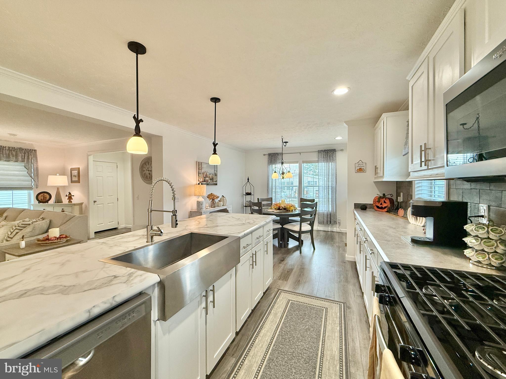 768 East Garden Road, Unit 7 Vineland, NJ 08360 - Photo 21 of 37 a large kitchen with lots of counter space a sink and appliances