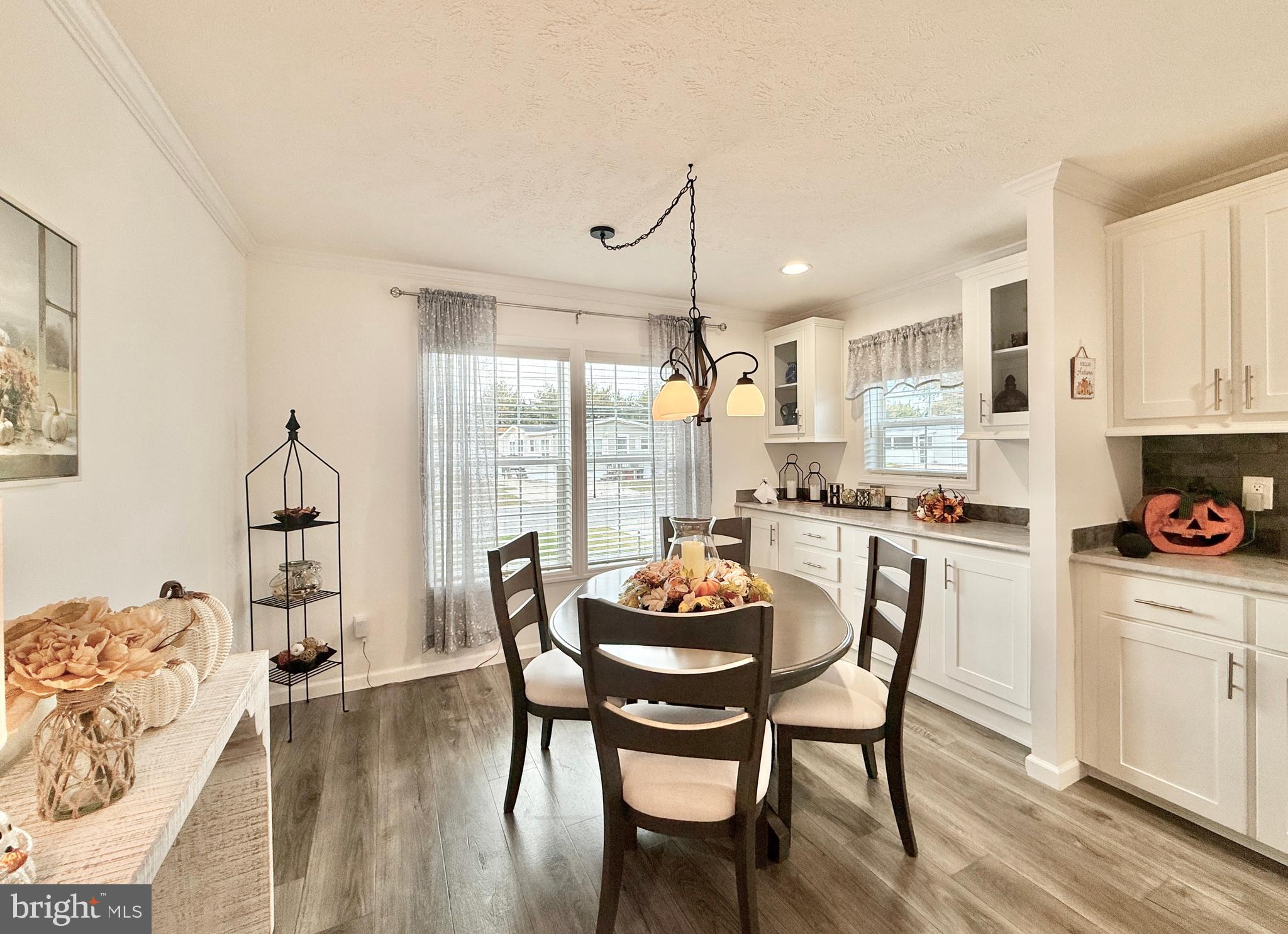 768 East Garden Road, Unit 7 Vineland, NJ 08360 - Photo 23 of 37 a dining room with furniture and wooden floor