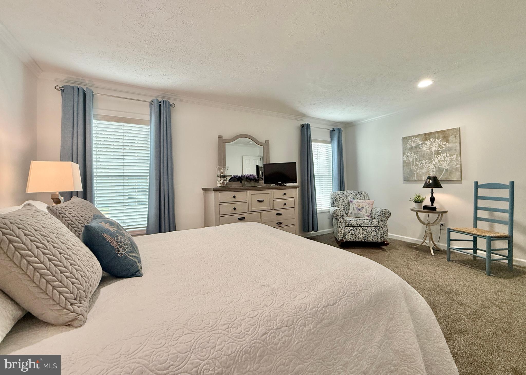 768 East Garden Road, Unit 7 Vineland, NJ 08360 - Photo 34 of 37 a bedroom with a bed and window