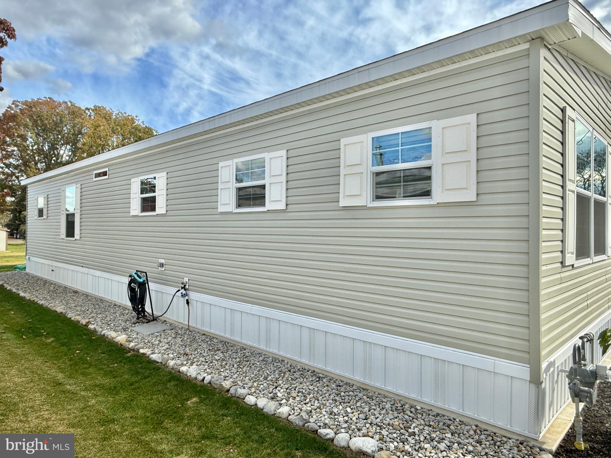 768 East Garden Road, Unit 7 Vineland, NJ 08360 - Photo 8 of 37 a view of a house with a yard