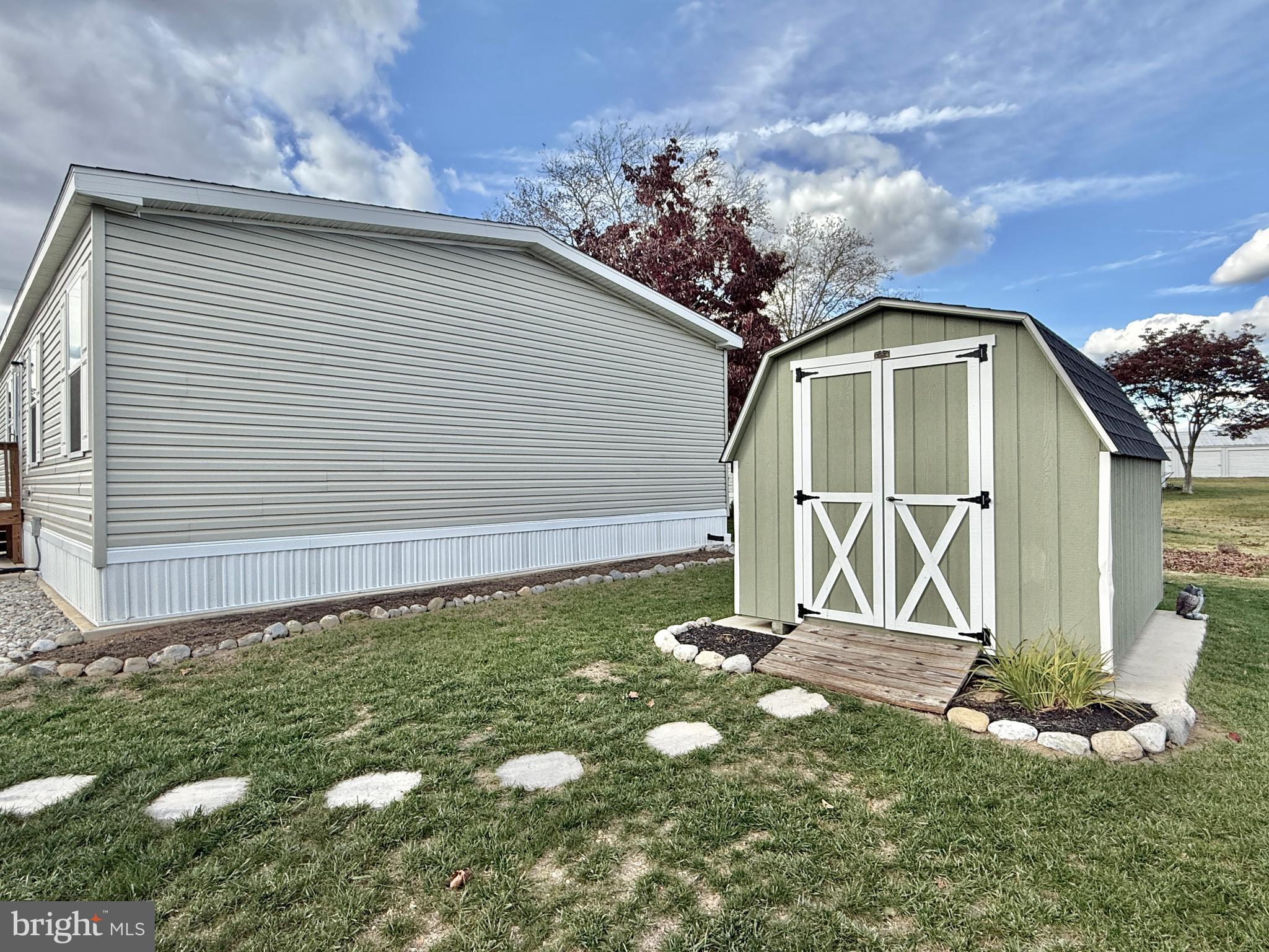 768 East Garden Road, Unit 7 Vineland, NJ 08360 - Photo 10 of 37 a front view of a house with garden