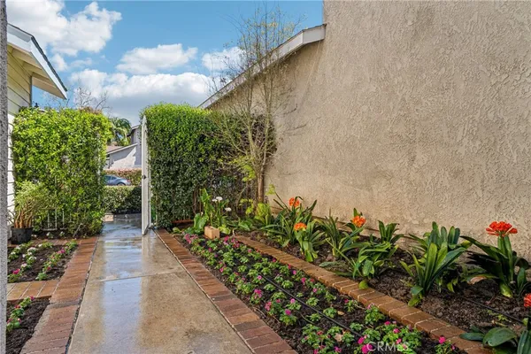 a house with garden in front of it