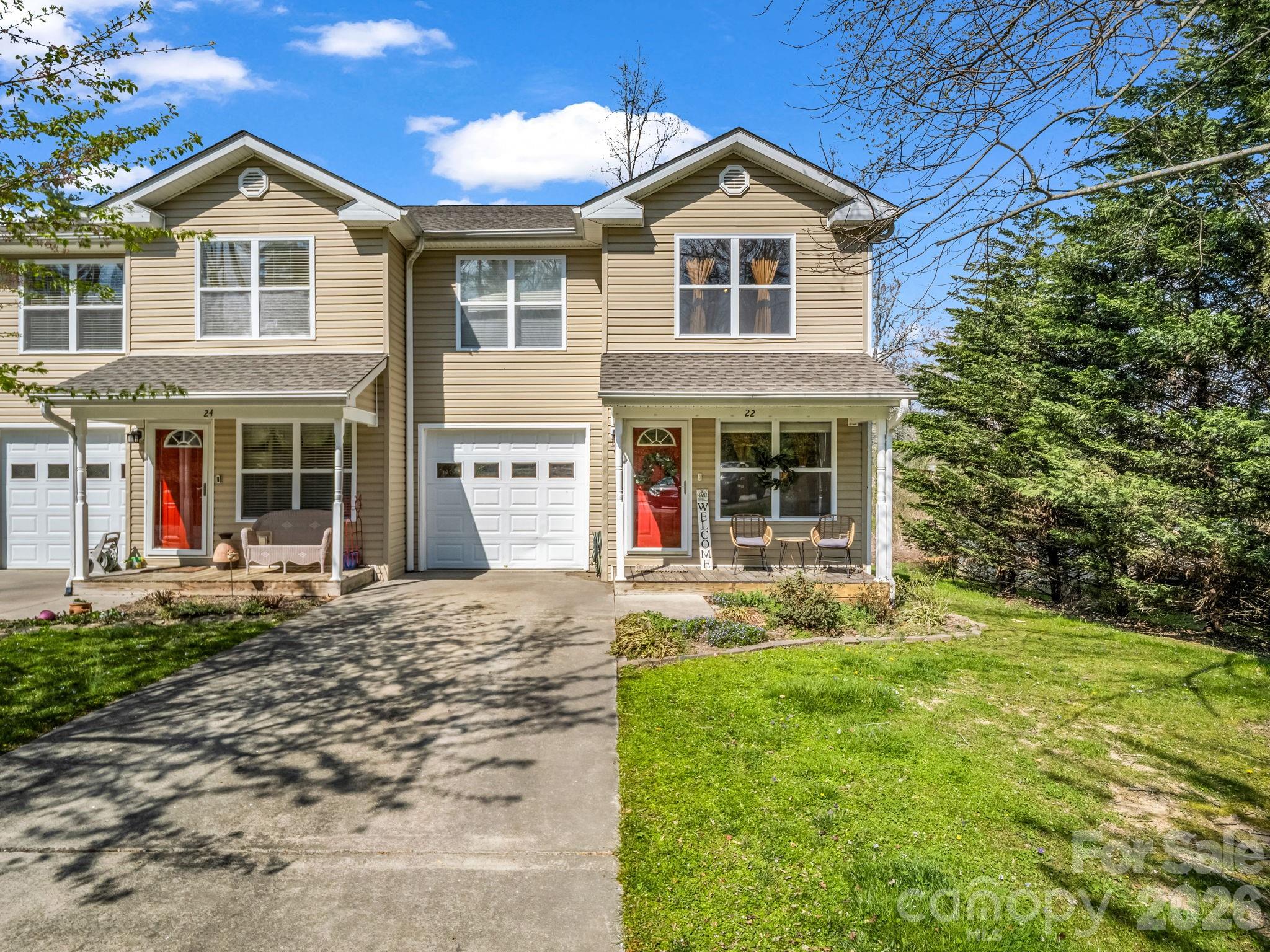 22 Macks Way Hendersonville, NC 28739 - Photo 2 of 42 a front view of a house with a yard