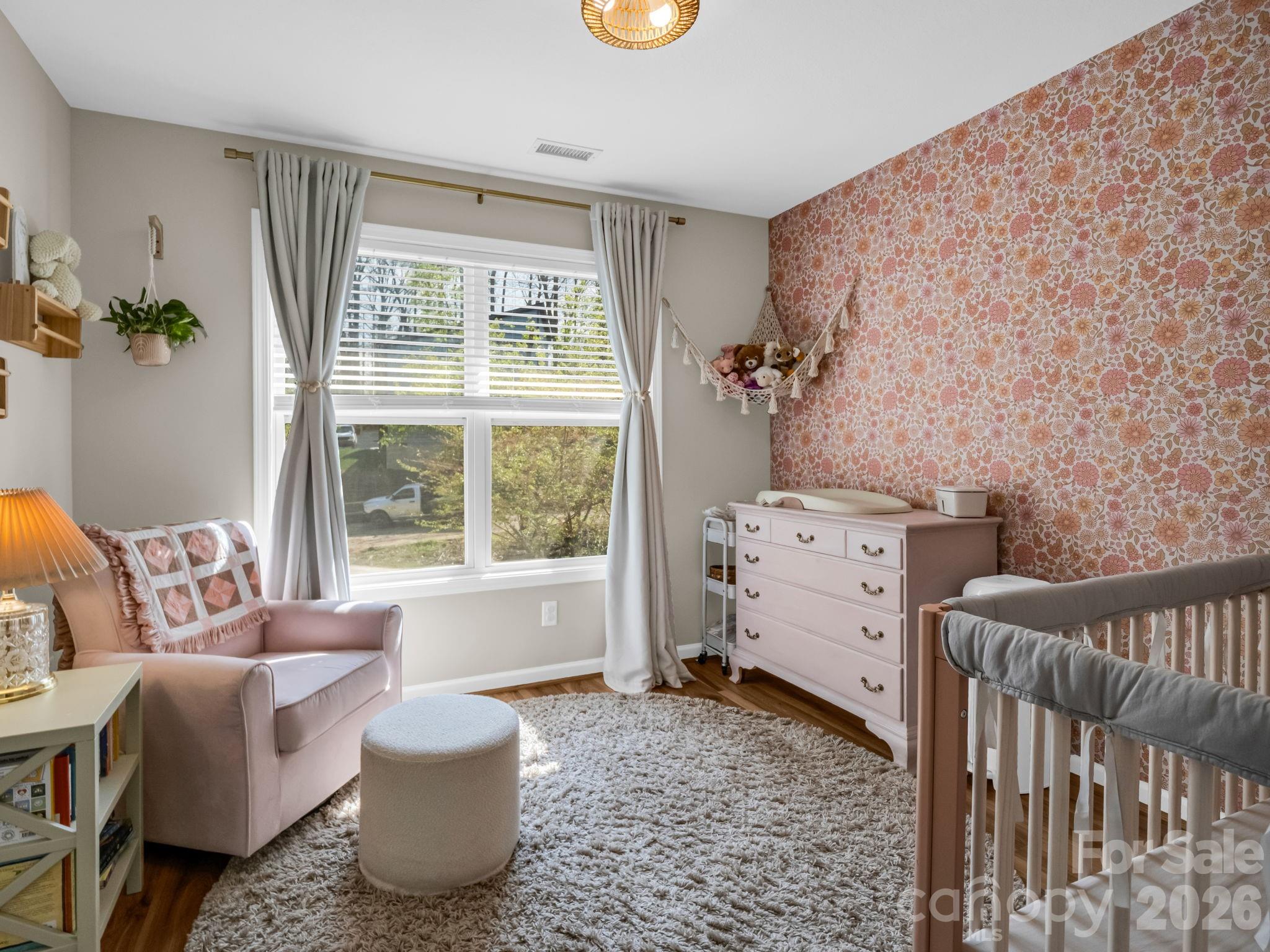 22 Macks Way Hendersonville, NC 28739 - Photo 25 of 42 a bedroom with furniture and a window