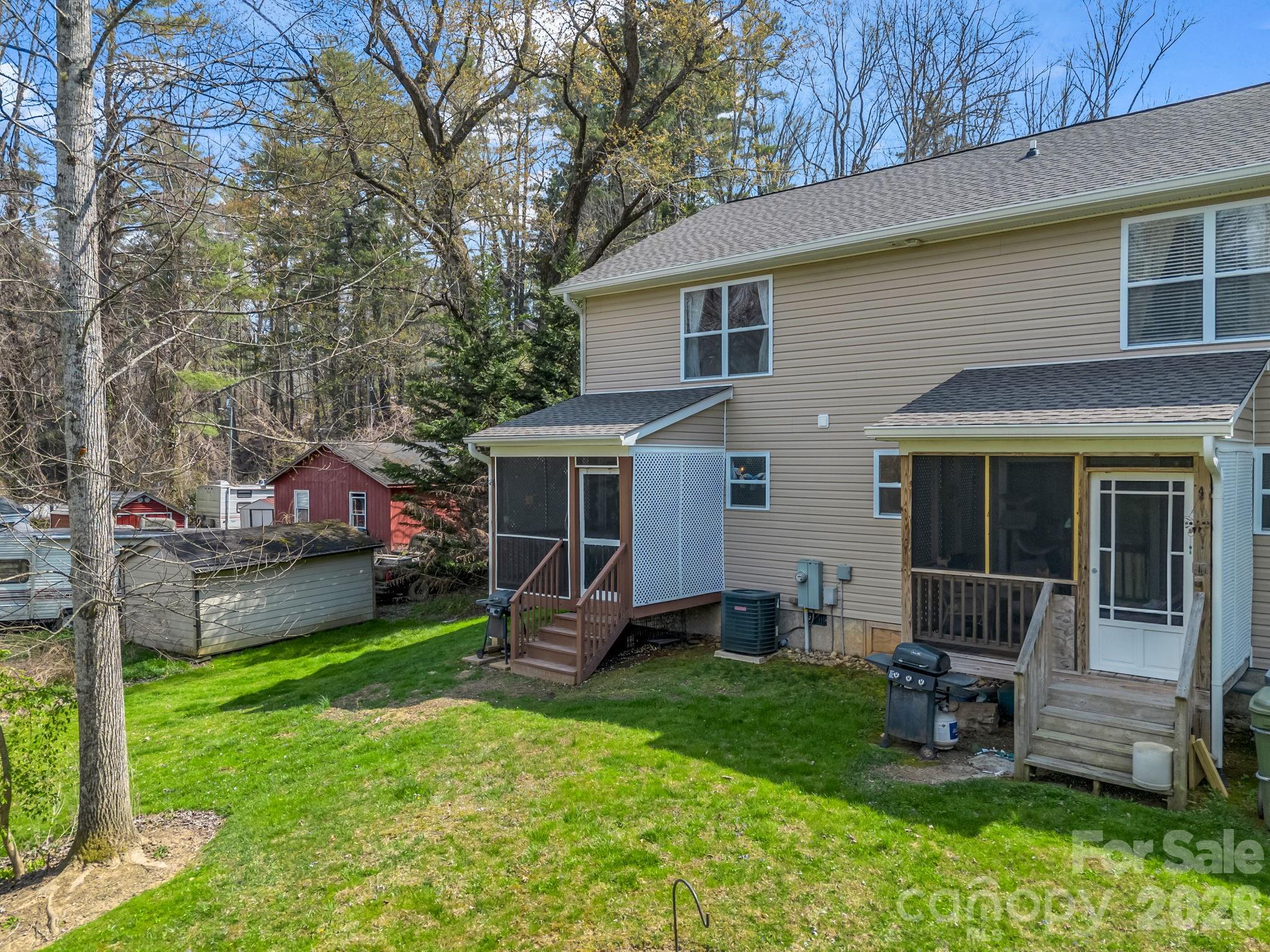 22 Macks Way Hendersonville, NC 28739 - Photo 35 of 42 a front view of a house with garden