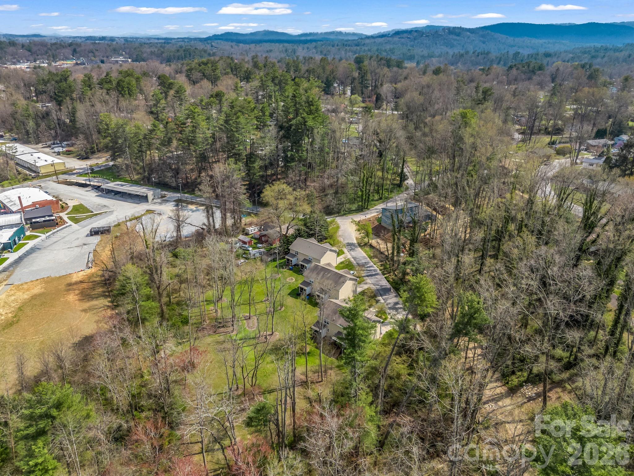 22 Macks Way Hendersonville, NC 28739 - Photo 39 of 42 a view of a lake with mountains in the background