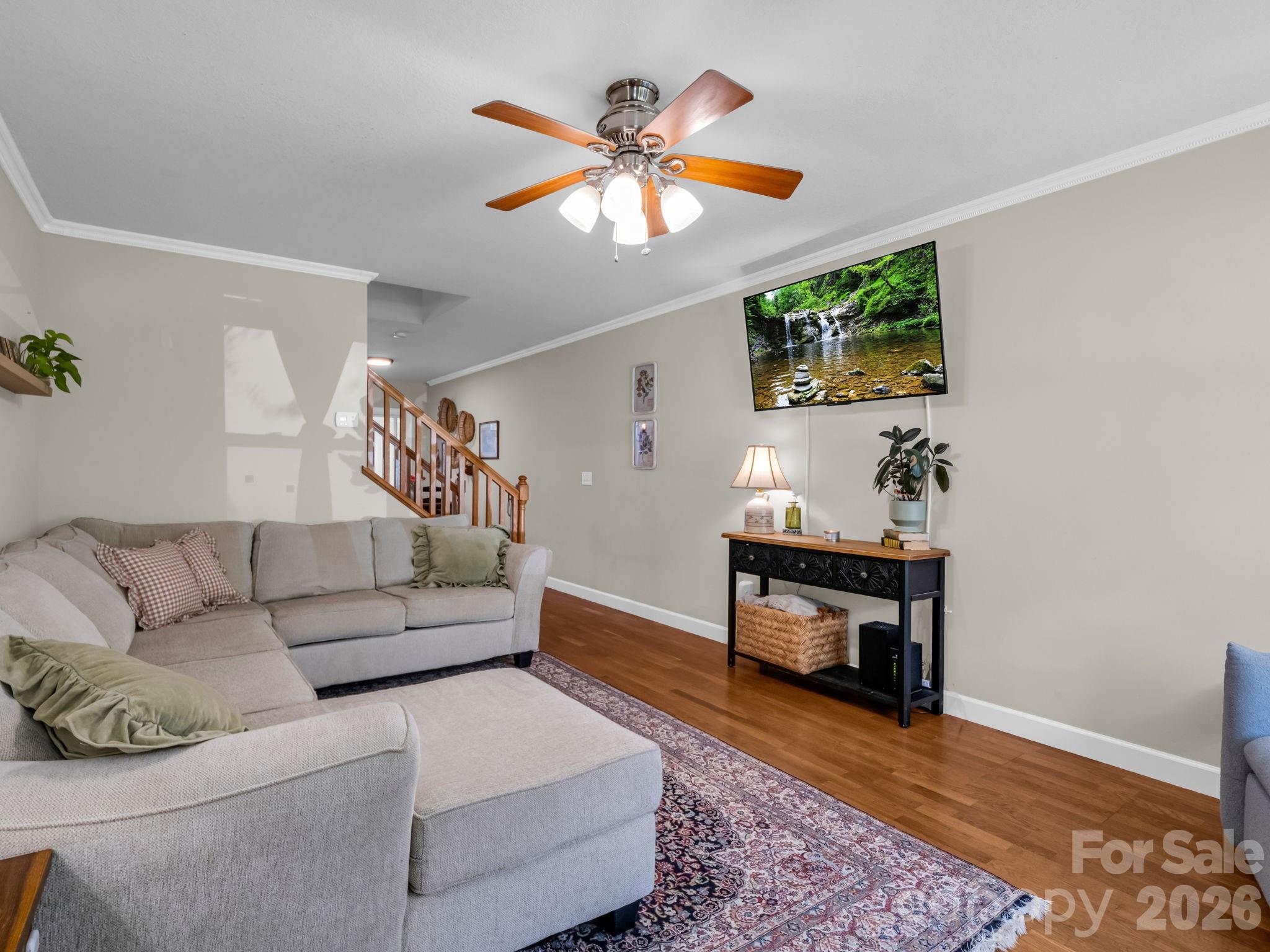22 Macks Way Hendersonville, NC 28739 - Photo 7 of 42 a living room with furniture and a wooden floor