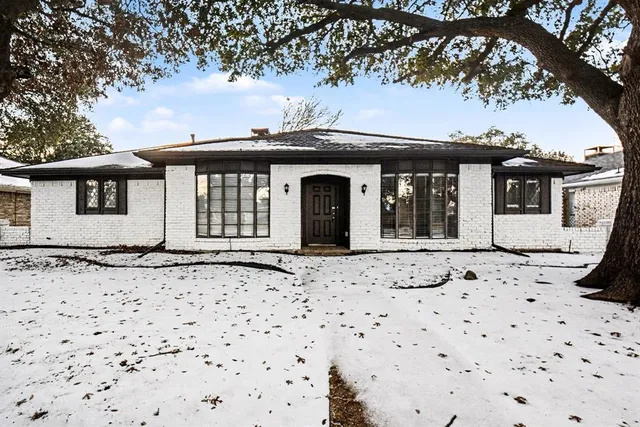 a front view of a house with a pathway