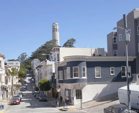 a front view of a building with street view