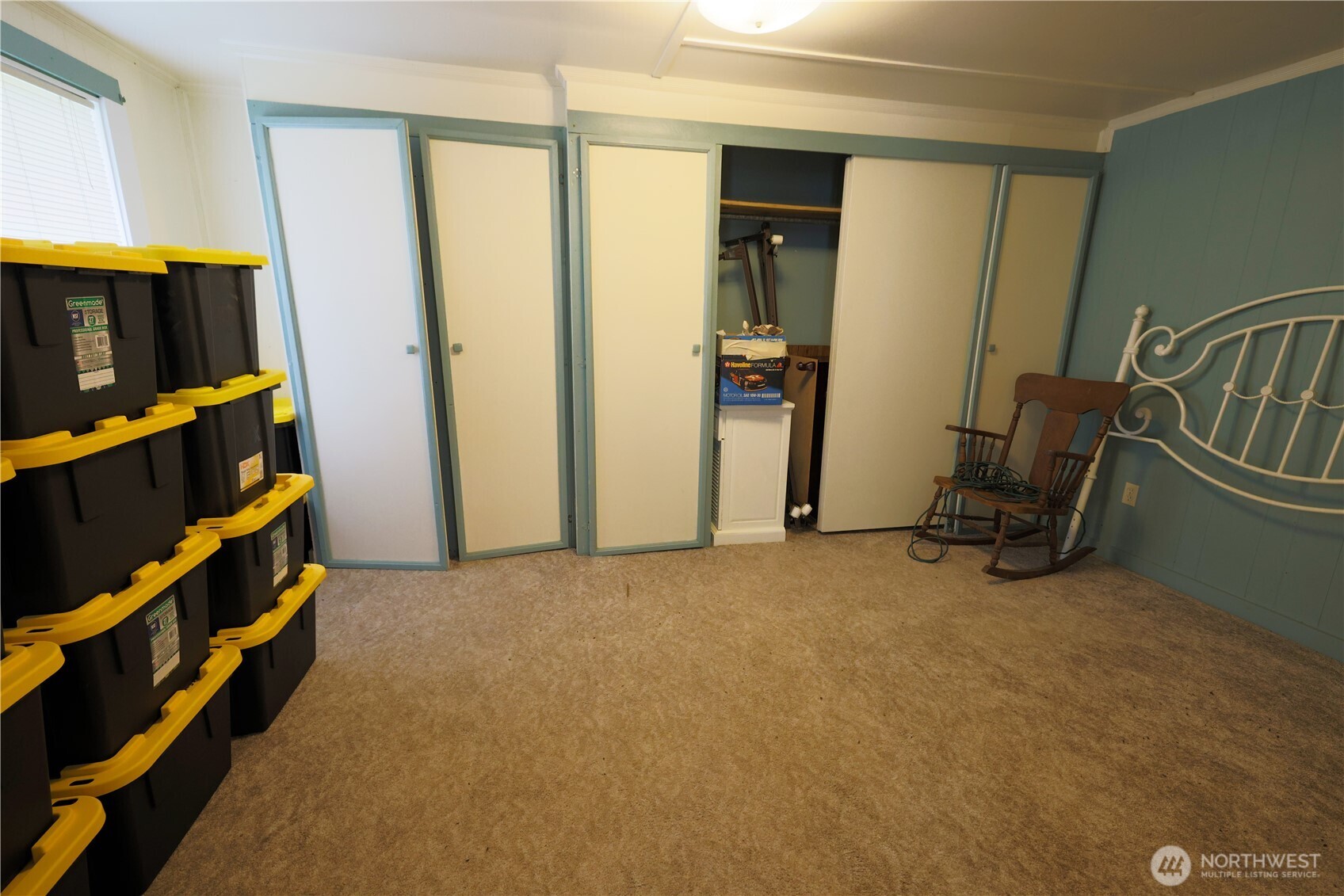 81 Hunt Road Port Hadlock, WA 98339 - Photo 8 of 20 a view of an empty room with furniture and a window