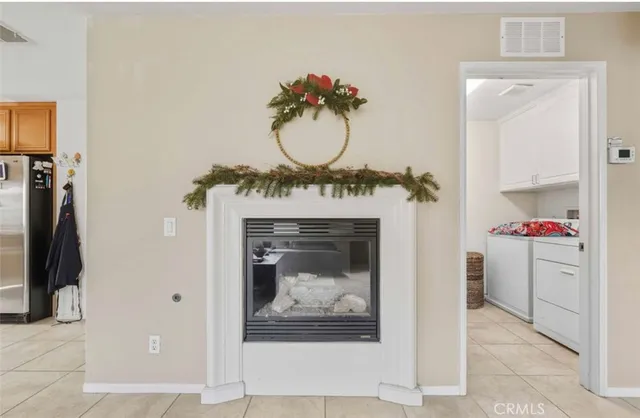 a view of a hallway with washer and dryer