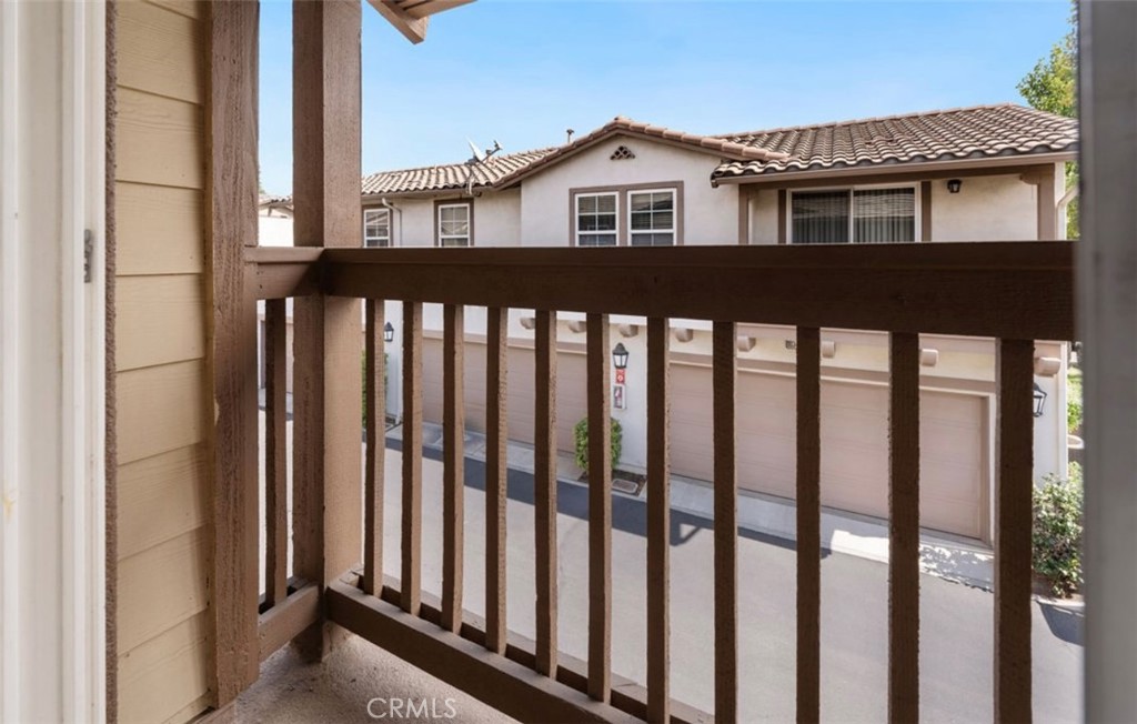 10326 Sparkling Drive, Unit 1 Rancho Cucamonga, CA 91730 - Photo 26 of 34 a view of a brick house with a large window